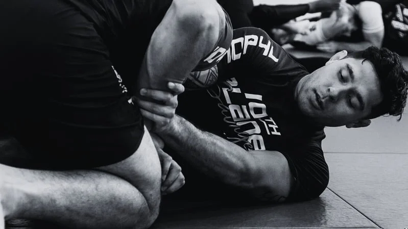 Adults grappling in the Adult Jiu Jitsu class
